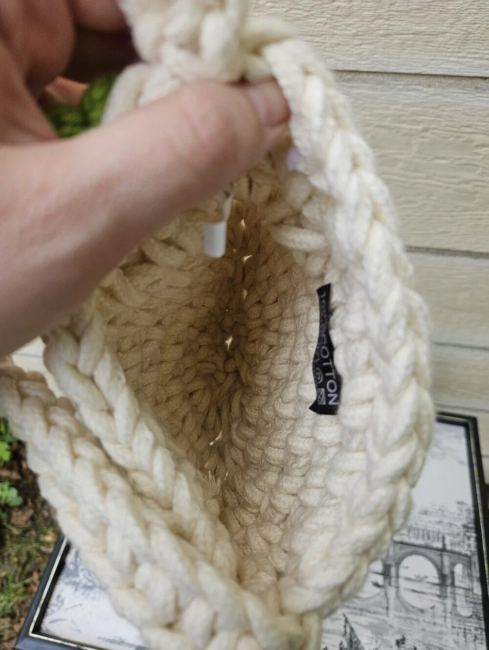 cream colored chunky crochet bag with flowers